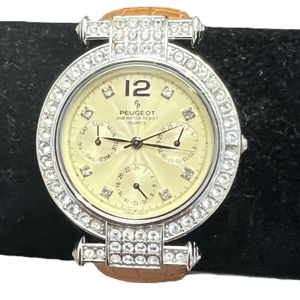P. PEUGEOT YELLOW FACE & CROCODILE STAMPED BAND WITH CRYSTAL BEZEL WATCH